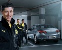 Opel Astra w wersji Active, Robert Lewandowski, Jakub Błaszczykowski i Łukasz Piszczek